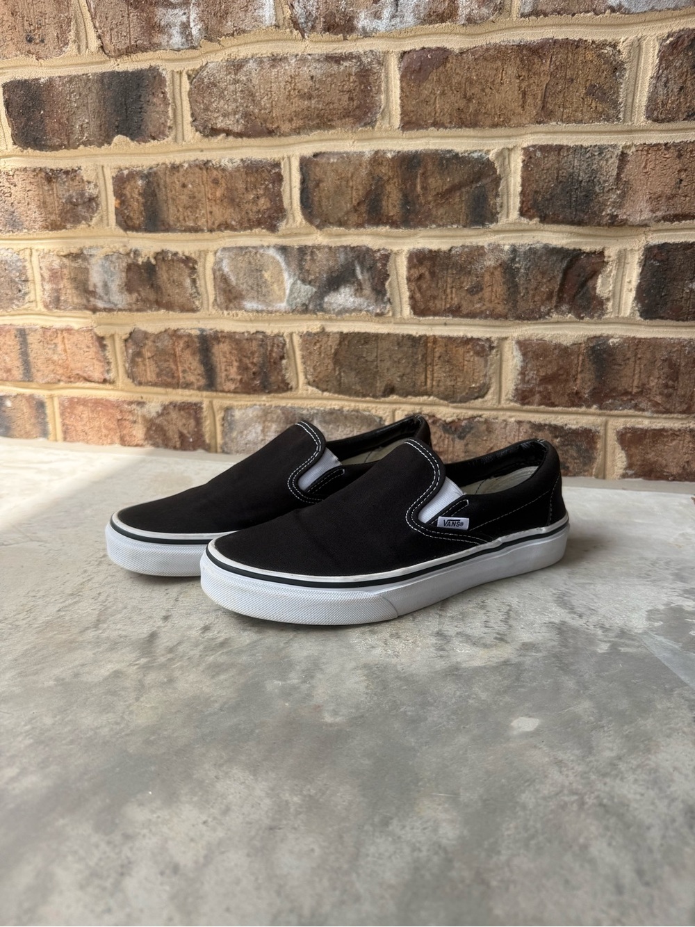 Vans Black & White Slip-On Canvas Sneakers